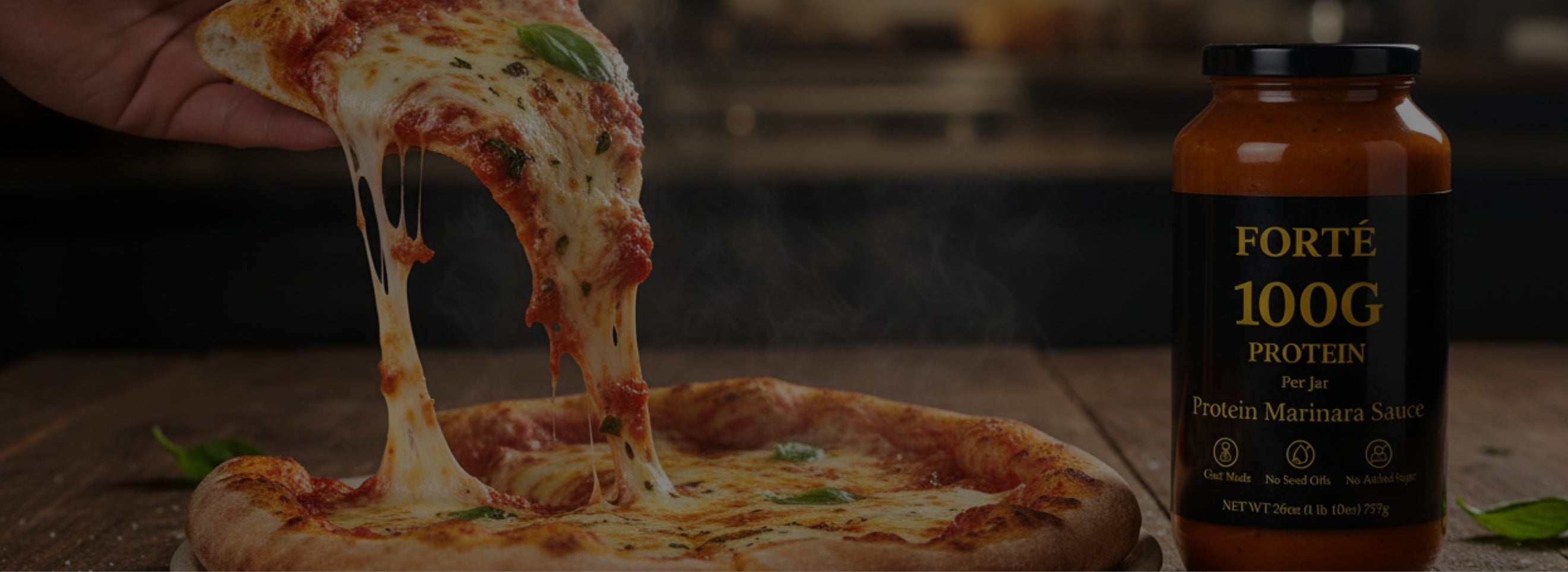 A delicious pizza with protein marinara on it giving it an extra 17g of protein. Next to it is a jar of protein pasta sauce with 100g of protein per jar